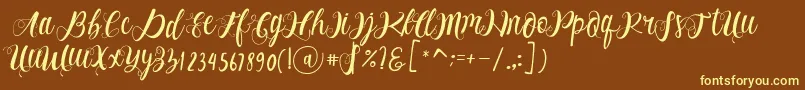 Alhenya Script-fontti – keltaiset fontit ruskealla taustalla