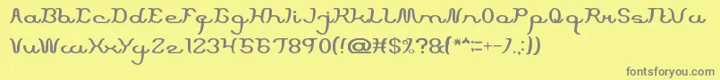 フォントScriptMachine – 黄色の背景に灰色の文字