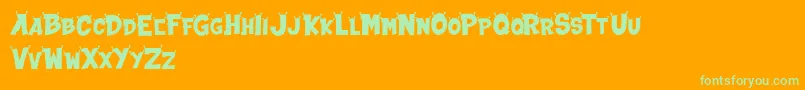 ALIEN INVASION DEMO Font – Green Fonts on Orange Background