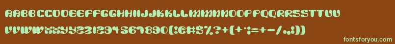 フォントAlien Mushrooms – 緑色の文字が茶色の背景にあります。