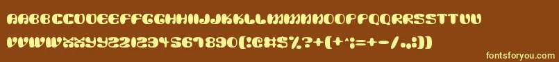 Alien Mushrooms-fontti – keltaiset fontit ruskealla taustalla