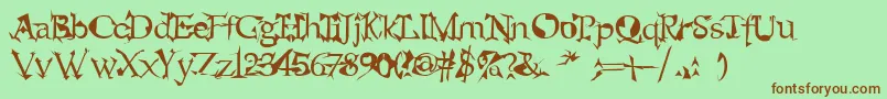 alien-Schriftart – Braune Schriften auf grünem Hintergrund