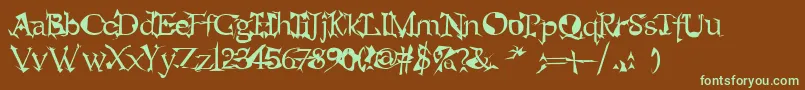 フォントalien – 緑色の文字が茶色の背景にあります。