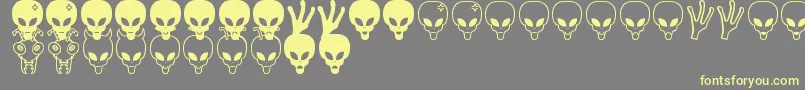 Aliens bats St Font – Yellow Fonts on Gray Background