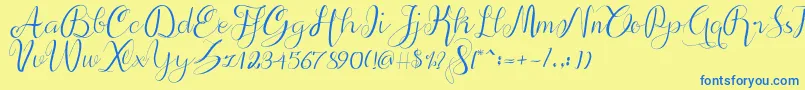 フォントalif script – 青い文字が黄色の背景にあります。
