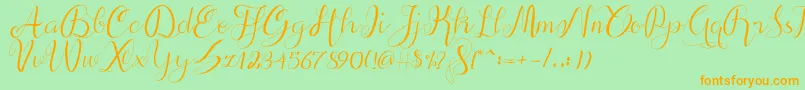 Czcionka alif script – pomarańczowe czcionki na zielonym tle