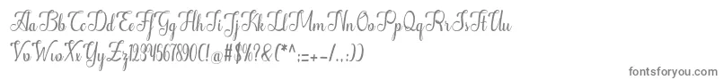 フォントAlifa – 白い背景に灰色の文字