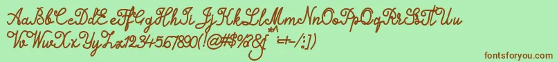 Alifia Font – Brown Fonts on Green Background