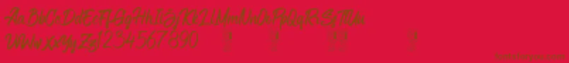 Aligore Regular Font – Brown Fonts on Red Background