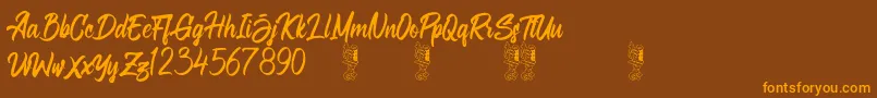 Aligore Regular Font – Orange Fonts on Brown Background