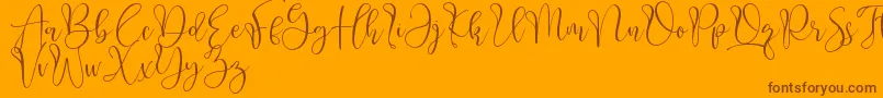 Aliquest-Schriftart – Braune Schriften auf orangefarbenem Hintergrund