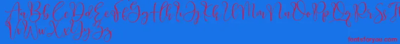 Aliquest-Schriftart – Rote Schriften auf blauem Hintergrund