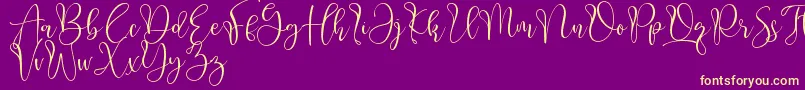 Aliquest Font – Yellow Fonts on Purple Background