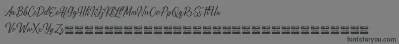 Alishader demo-Schriftart – Schwarze Schriften auf grauem Hintergrund