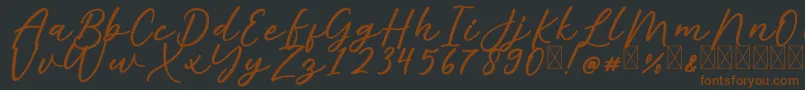 AlishaFree Font – Brown Fonts on Black Background
