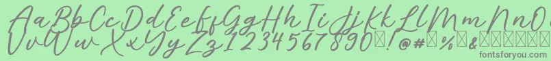 AlishaFree Font – Gray Fonts on Green Background