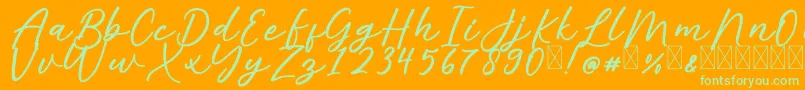 AlishaFree-Schriftart – Grüne Schriften auf orangefarbenem Hintergrund