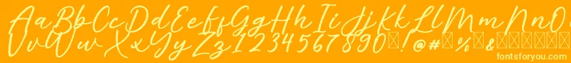 AlishaFree Font – Yellow Fonts on Orange Background