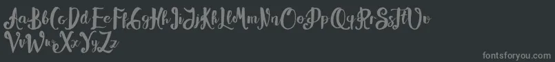 フォントAlissya – 黒い背景に灰色の文字