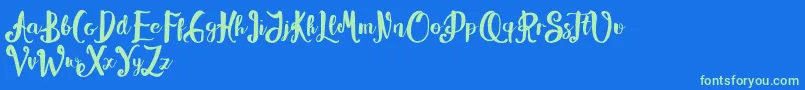 Alissya Font – Green Fonts on Blue Background
