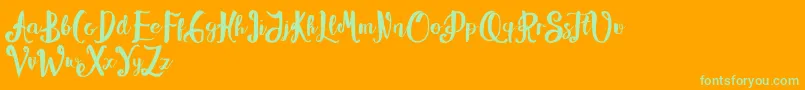 Alissya Font – Green Fonts on Orange Background