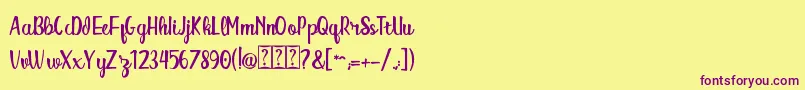 Шрифт Alitta DEMO – фиолетовые шрифты на жёлтом фоне