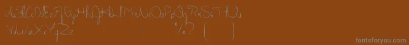 Weitere Informationen zur Allabamafree-Schriftart Allabamafree-Schriftart – Graue Schriften auf braunem Hintergrund