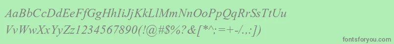 フォントKokilaItalic – 緑の背景に灰色の文字