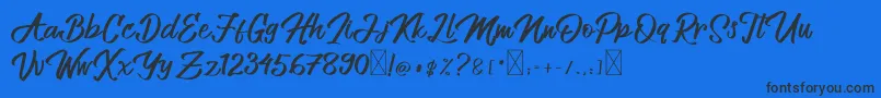 Allenattore Font – Black Fonts on Blue Background