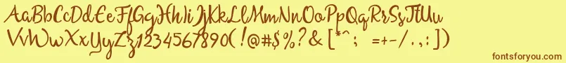 Fonte AllessaScriptFreeSample – fontes marrons em um fundo amarelo