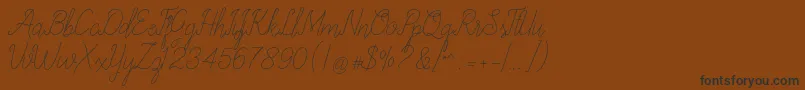 More about allexandrea Font allexandrea Font – Black Fonts on Brown Background