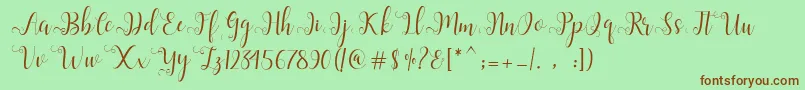 Шрифт Alliana Script  – коричневые шрифты на зелёном фоне