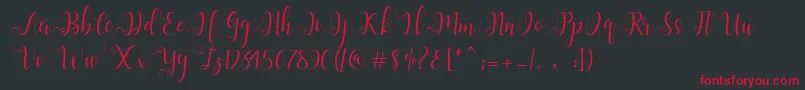 フォントAlliana Script  – 黒い背景に赤い文字