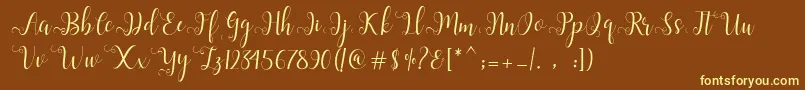 Шрифт Alliana Script  – жёлтые шрифты на коричневом фоне