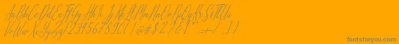 Alliando-Schriftart – Graue Schriften auf orangefarbenem Hintergrund