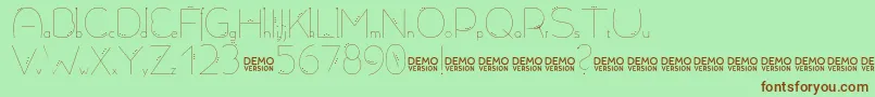 Allioideae Demo Dot Font – Brown Fonts on Green Background