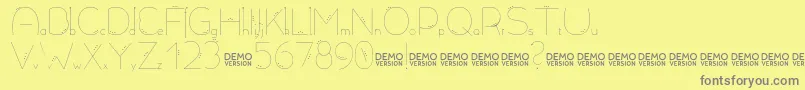 Allioideae Demo Dot Font – Gray Fonts on Yellow Background