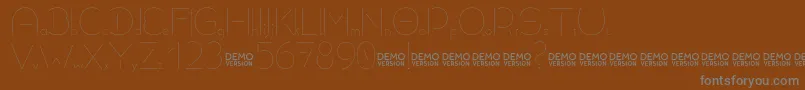 Шрифт Allioideae Demo Stencil – серые шрифты на коричневом фоне