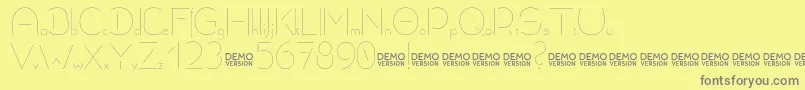 Allioideae Demo Stencil-Schriftart – Graue Schriften auf gelbem Hintergrund