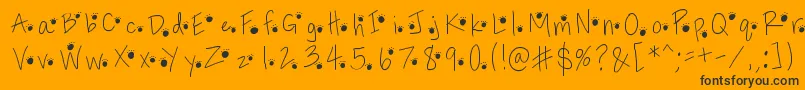 Pawprints Font – Black Fonts on Orange Background