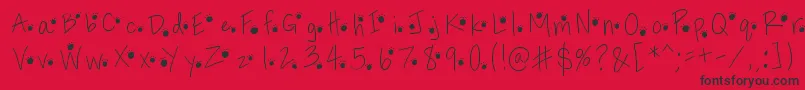 Pawprints Font – Black Fonts on Red Background