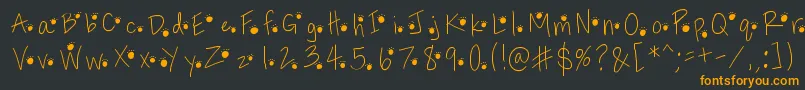 Pawprints Font – Orange Fonts on Black Background