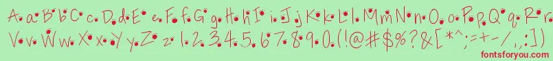 Pawprints Font – Red Fonts on Green Background
