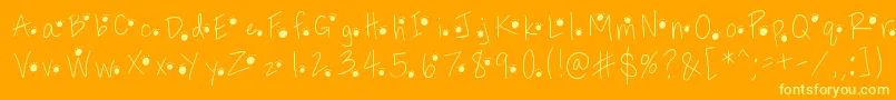 Pawprints Font – Yellow Fonts on Orange Background