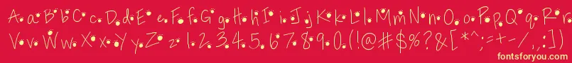 Pawprints Font – Yellow Fonts on Red Background