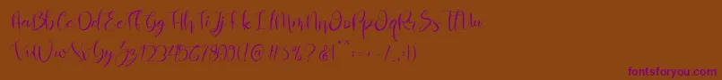 Almahira Script Font – Purple Fonts on Brown Background