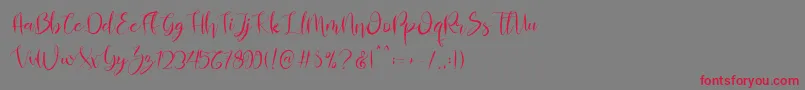 Czcionka Almahira Script – czerwone czcionki na szarym tle