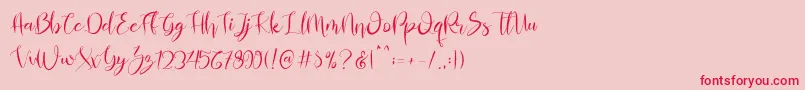Almahira Script Font – Red Fonts on Pink Background