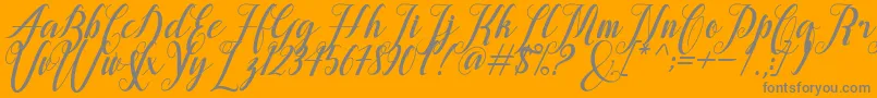 alongtime-fontti – harmaat kirjasimet oranssilla taustalla