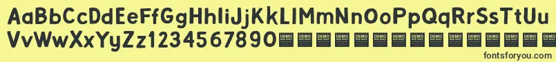 Alpha Beta   Demo-Schriftart – Schwarze Schriften auf gelbem Hintergrund